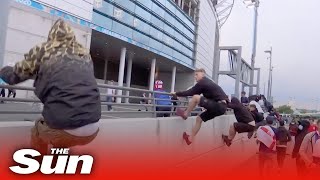 Ticketless fans rush Wembley Stadium security barriers at England vs Italy Euro 2020 final [upl. by Htial]